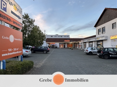 Ladenfläche / Praxis gegenüber REWE mit vielen Parkplätzen!